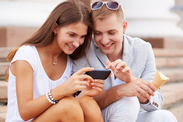 Couple with mobile phone