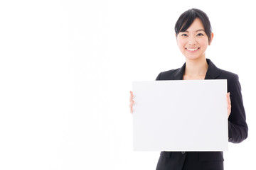 Naklejka premium young asian businesswoman with whiteboard