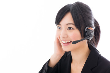 young asian businesswoman with headset talking