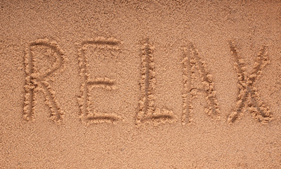 Word Relax on beach - vacation concept background