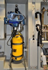 Portable oxygen recharge inside the military transport aircraft.