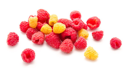 Heap of red and yellow raspberry isolated