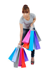 young asian woman with colorful shopping bags