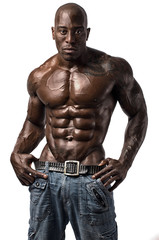 Fototapeta na wymiar Strong bodybuilder man with perfect abs,biceps, chest