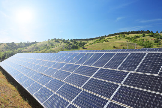 Solar photovoltaic cell panels under sunny sky