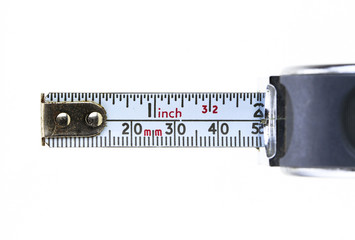 closeup of a metal tape measure in a white background