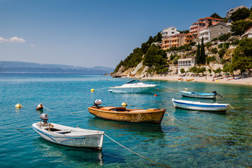 Fototapeta na wymiar Motor Boats in a Quiet Bay near Split, Croatia