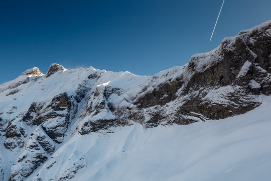 Mountain Peak and Airplane Trail near Megeve in French Alps, Fra