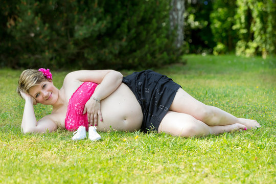 pregnant woman on the grass