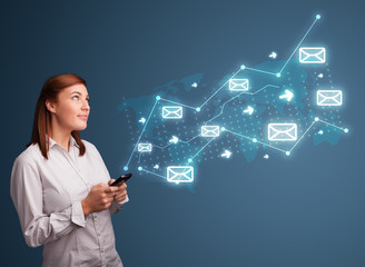 Young lady holding a phone with arrows and message icons