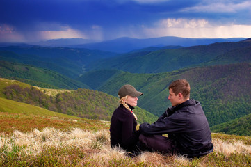 Fototapeta na wymiar Boy and girl in the mountains