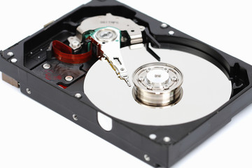 Closeup internal computer hard disk.