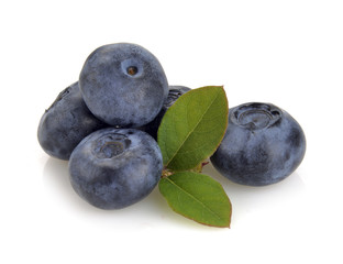 blueberry and green leaves