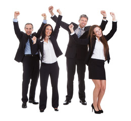 Happy Businesspeople Jumping In Joy