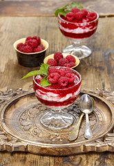 Raspberry dessert on wooden table