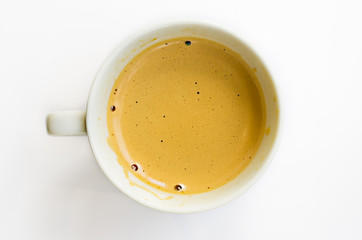 close up of coffee cup on white background
