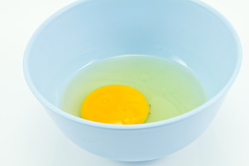 Raw eggs in a cup