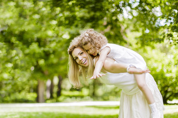 Mother and daughter in the park
