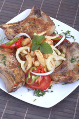 Fried pork chops and vegetables
