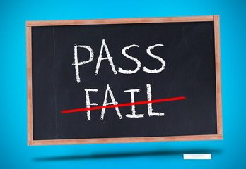 Pass and fail written on blackboard