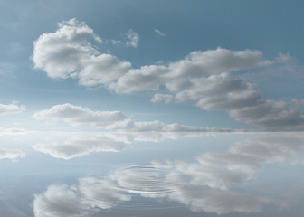 Reflection of the sky on a puddle