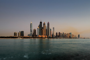 Fototapeta premium Dubai Marina skyline as seen from Palm Jumeirah, UAE