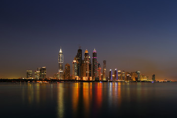 Fototapeta na wymiar Dubai Marina, UAE at dusk as seen from Palm Jumeirah