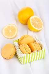 Macaroons on white cloth close-up