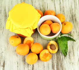 Fresh apricots and apricot jam in jar,