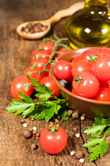 Vegetarian food: still life with fresh cherry tomatoes
