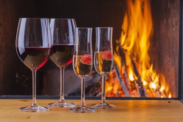 delicious wine, drinks and snacks at fireplace