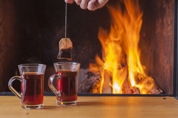 healthy tea at fireplace