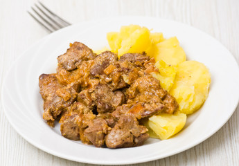 chicken livers in a creamy sauce with potato