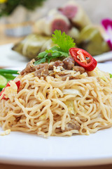 Fried noodles with pork.
