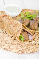 Kati Roll - Kofta and red onion in a paratha fried with eggs