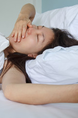 Obraz na płótnie Canvas woman sleeping in bed