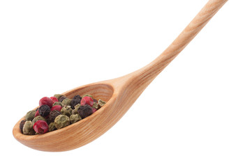 Pepper seasoning  mix in wooden spoon isolated on white backgrou
