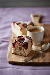 Homemade raspberry cake and a cup of coffee