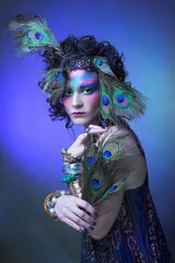Woman in peacock image.
