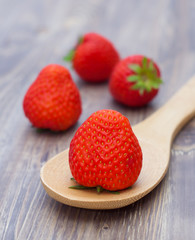 Fresh strawberry on wooden board