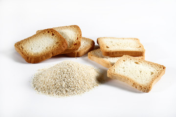 group biscuits and bread crumbs on white