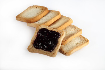 group biscuits with jam on white