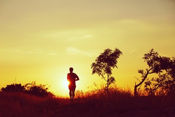 Running at the sunset - back lit