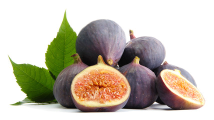 Ripe sweet figs with leaves isolated on white