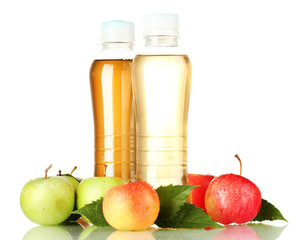 two bottles of juice with sweet apples, isolated on white
