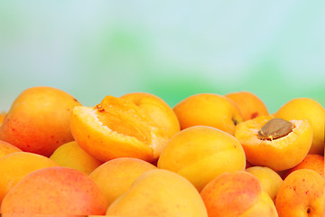 Fresh natural apricot on bright background