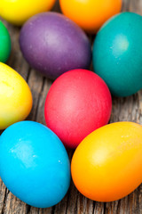 Fototapeta na wymiar Easter eggs on wooden surface