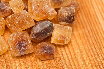 brown caramelized sugar on wooden surface