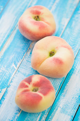 Still life fruits: donut peaches, vertical shot