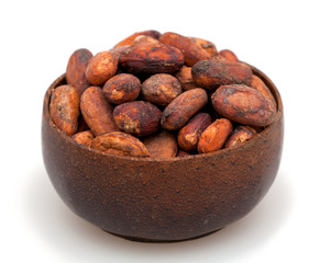 cocoa beans in a wooden bowl
